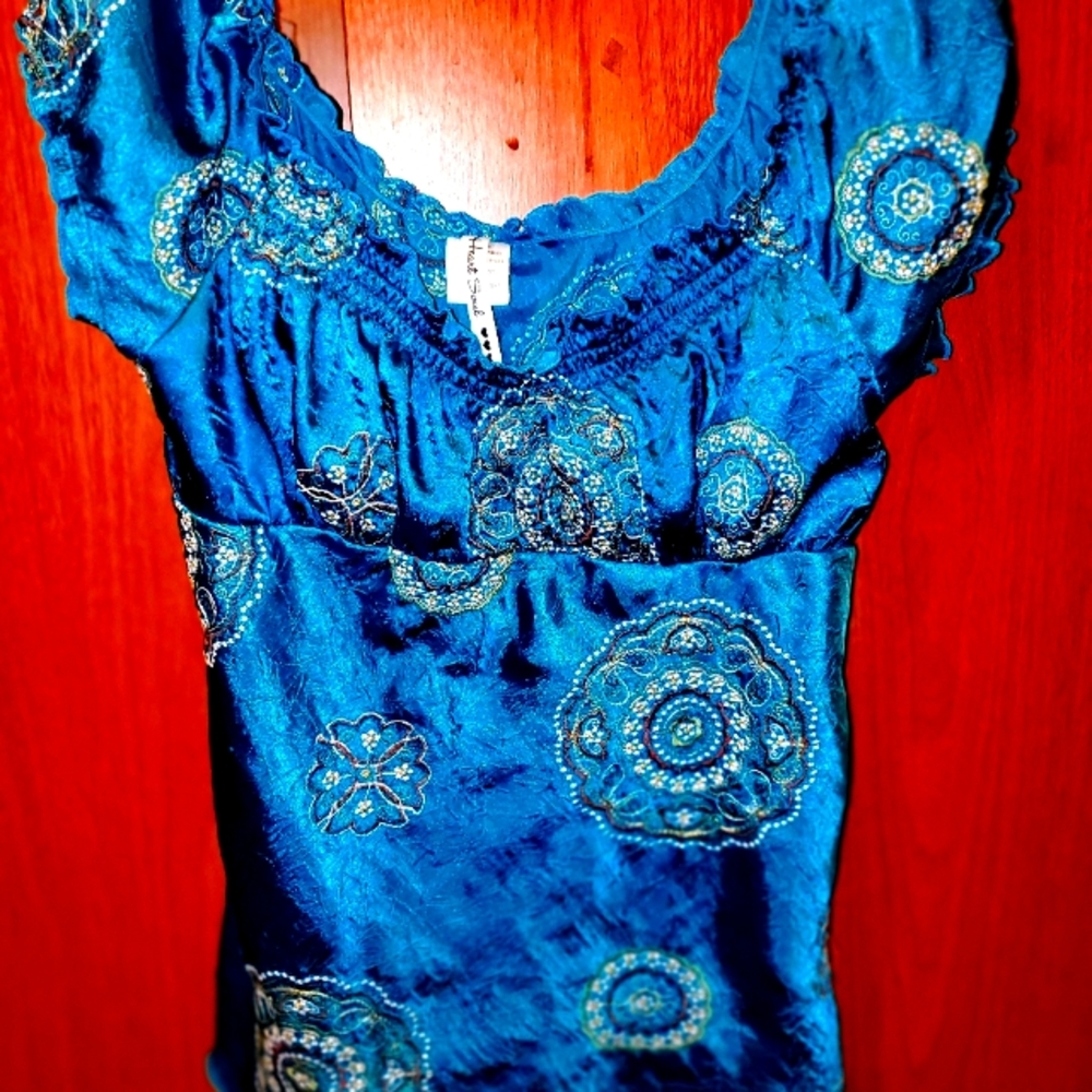 Size XL silk, made in China. Very sexy on.